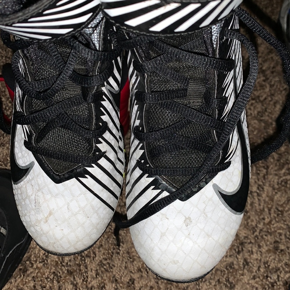Nike Cleats for football. Size 2. Black and white